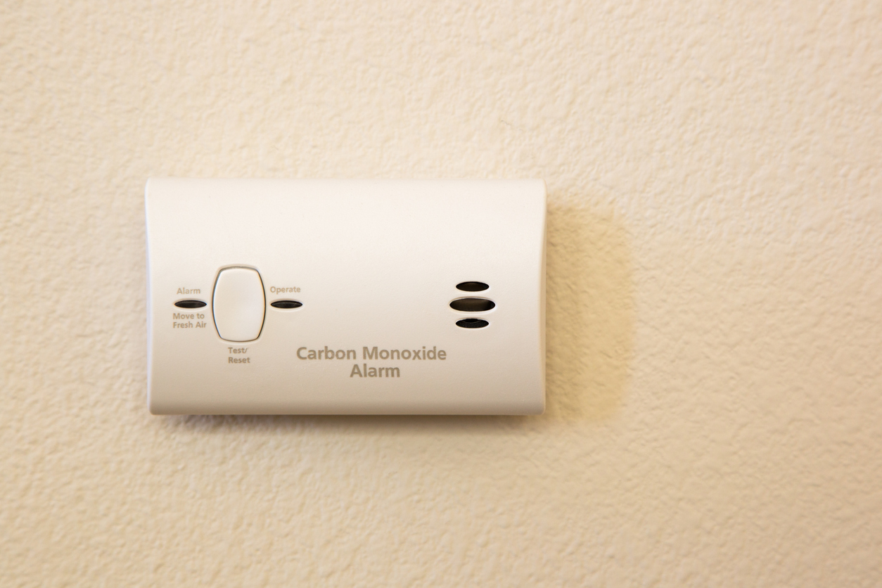 Carbon Monoxide Alarm Attached to Wall in House